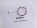 Pierścionek z granatu, rubinu i hematytu dla Skorpiona. Kosmiczna biżuteria z gwiazdkami i księżycem.