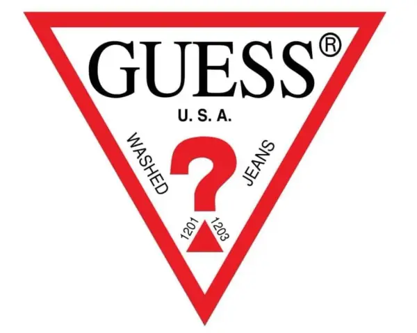 Logo Guess. Czerwony trójkąt z napisem "GUESS U.S.A.", znakiem zapytania i hasłami "WASHED JEANS".